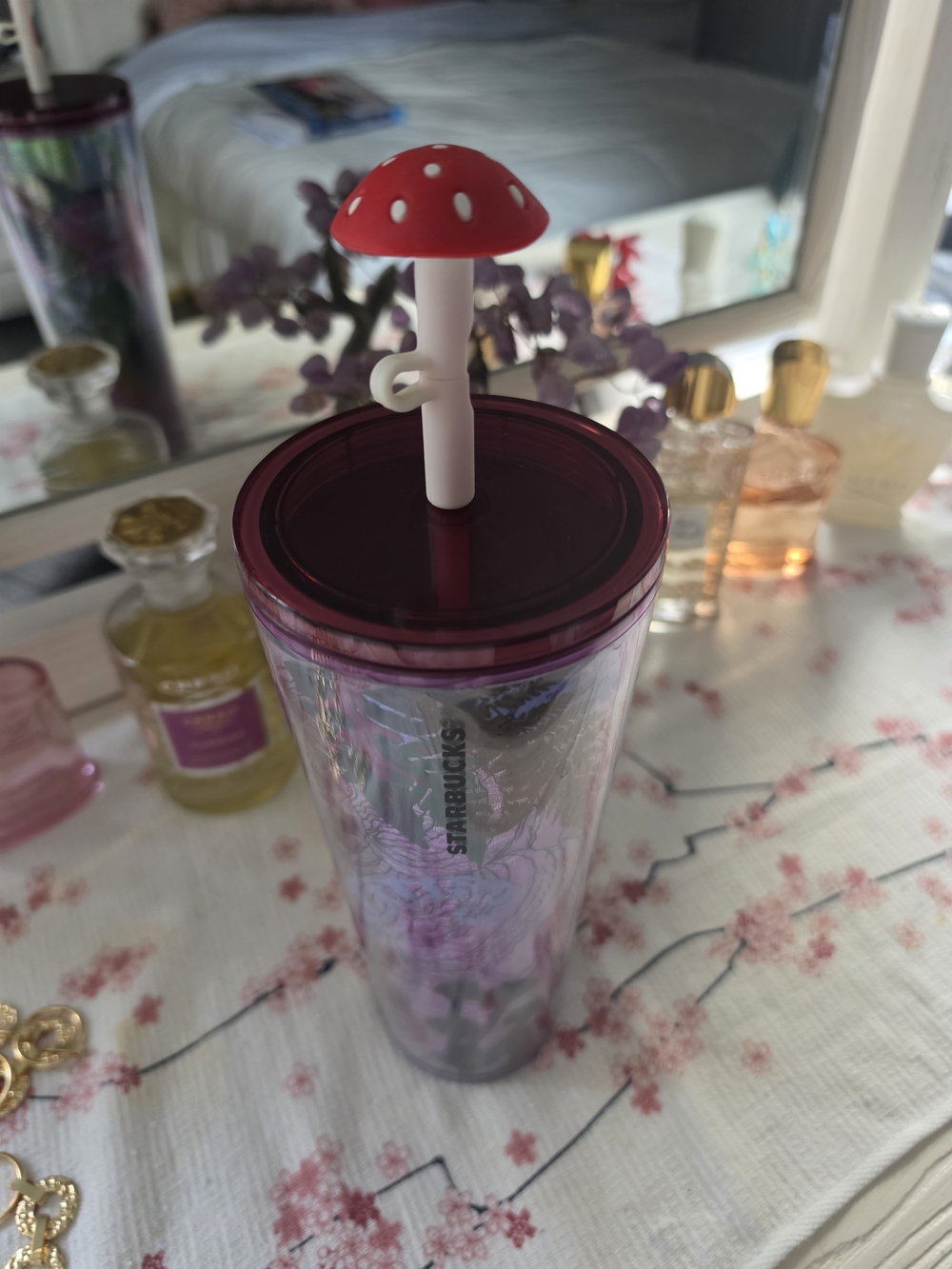 Starbucks Holiday 2022 Enchanted Forest Venti tumbler with a mushroom straw topp